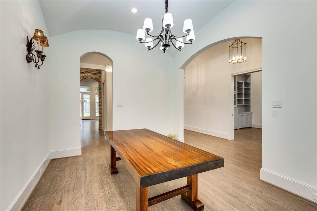 another view of the dining room, looking into wine bar and entry hallway