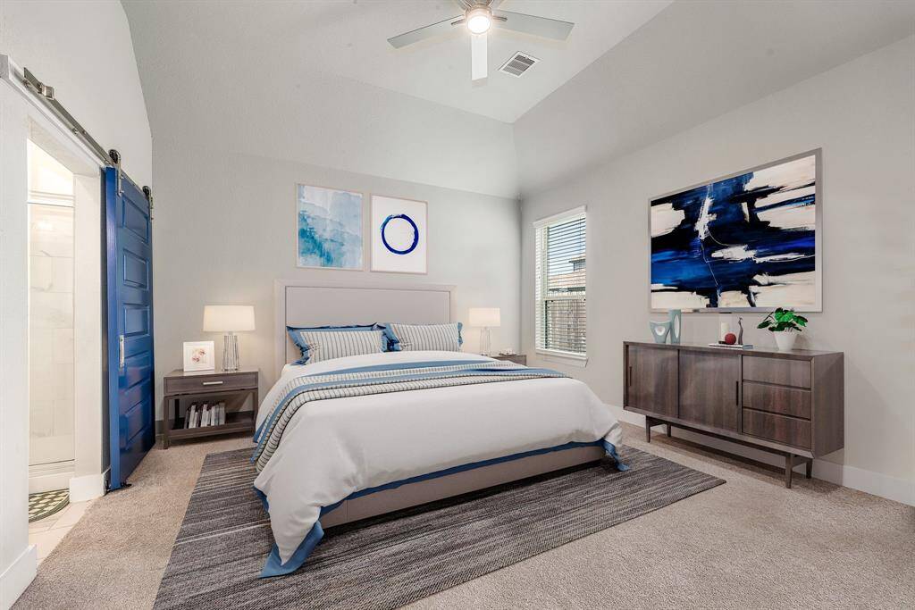 What a wonderful place to come home to, this stunning primary suite greets you with plush carpet, a warm custom paint, high ceiling, ceiling fan with lighting, lovely windows with blinds allowing in natural light brightening up this spacious primary bedroom, with extra space for a seating area. *Virtually Staged
