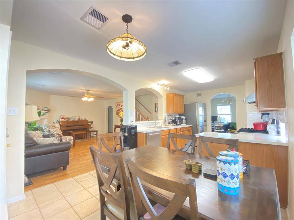 Breakfast area connect to kitchen. Also step away from backyard balcony.