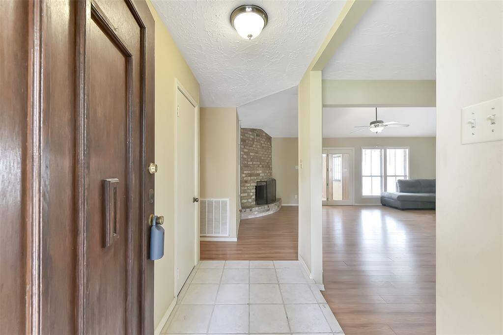 Step into this inviting entryway that offers a warm first impression.