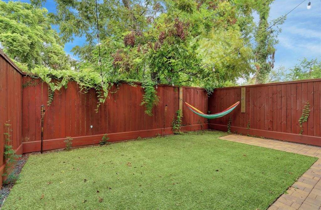 Whether you're hosting friends or enjoying a quiet moment outdoors, this private backyard oasis is the perfect extension of the home’s warm, Mediterranean character.