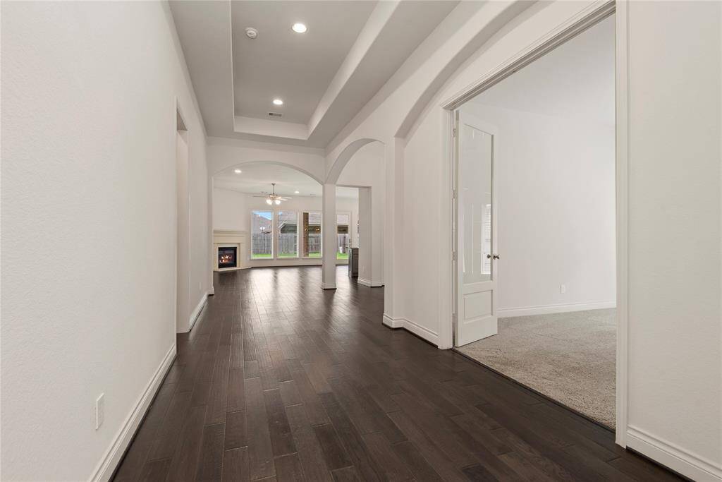 Grand entrance with 13-foot tray ceilings and gorgeous floors.