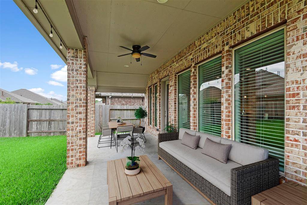 Large, covered patio. Virtually staged.