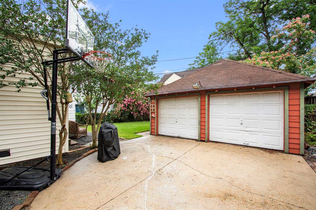 The detached, two car garage provides additinal storagea and parking. Its location on the property means you benefit from the storage without impacting the charming curb appeal of your bungalow. Within the garage, you will find the utility area for the home.