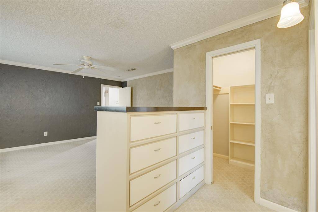 One of two walk-in closet and added drawers for convenience.