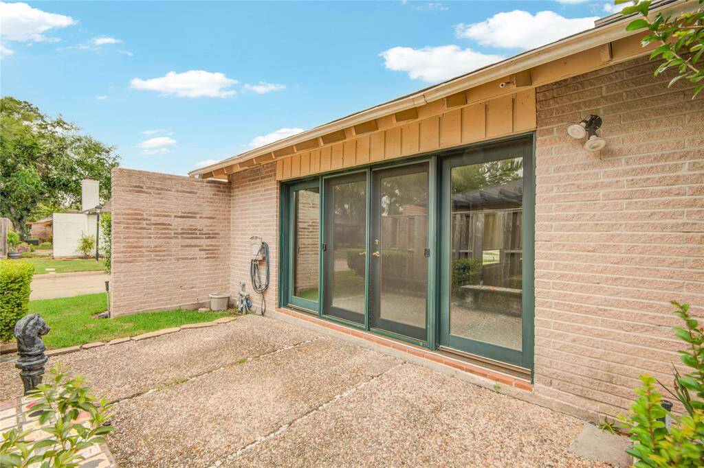 Here you see the private side patio off of the family room.