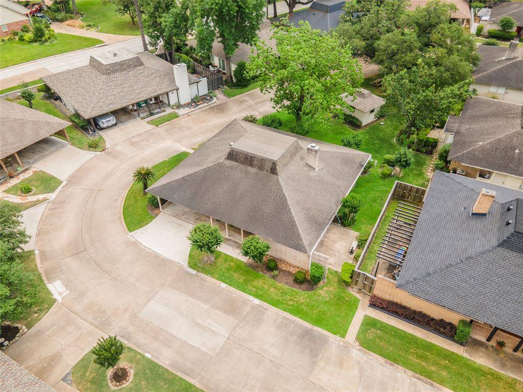 This charming 2-bedroom, 2-bath corner home is beautifully landscaped and nestled on a quiet street near the golf course.