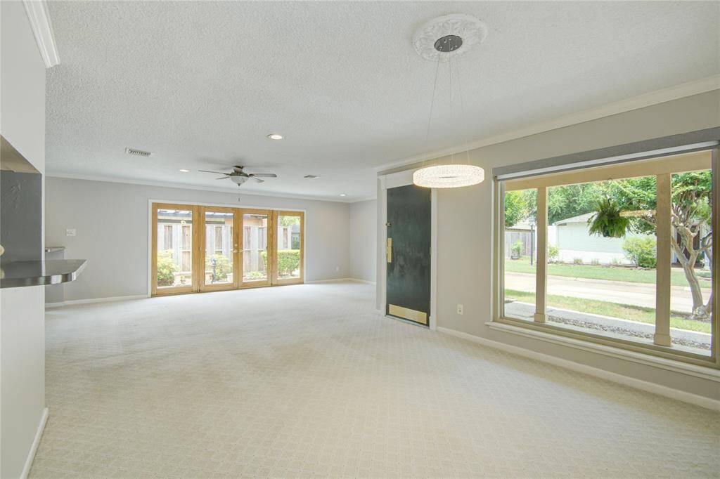From this perspective you can see all the bright light from the picture windows and how spacious the layout is.