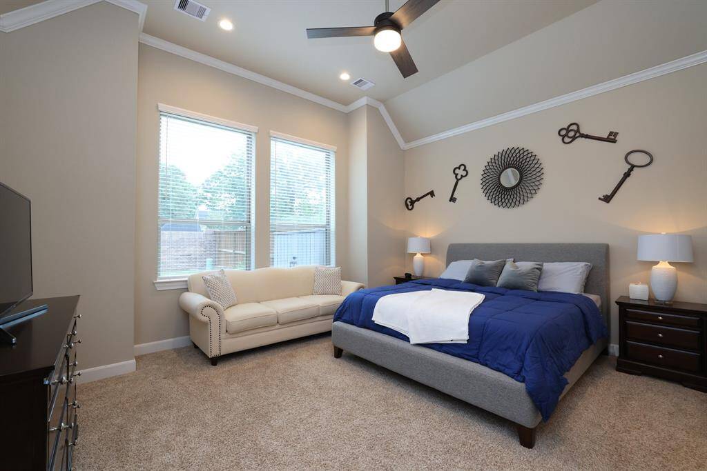 Experience the natural light flooding this space as you gaze over your backyard, envisioning the possibilities for creating the outdoor oasis you've always dreamed of. Imagine waking up to this view every day, inspiring you to make it your own.