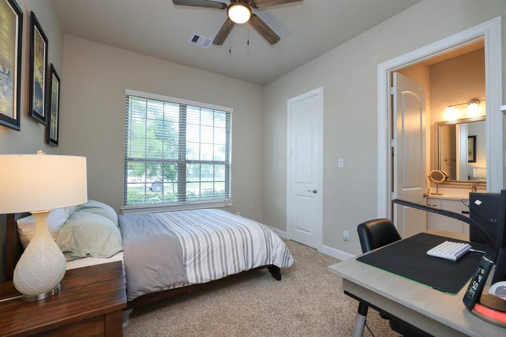 Another bedroom showcases the cleanliness and excellent maintenance evident throughout this home. You'll appreciate the homes ample storage and closet spaces, adding to the home's appeal and functionality.