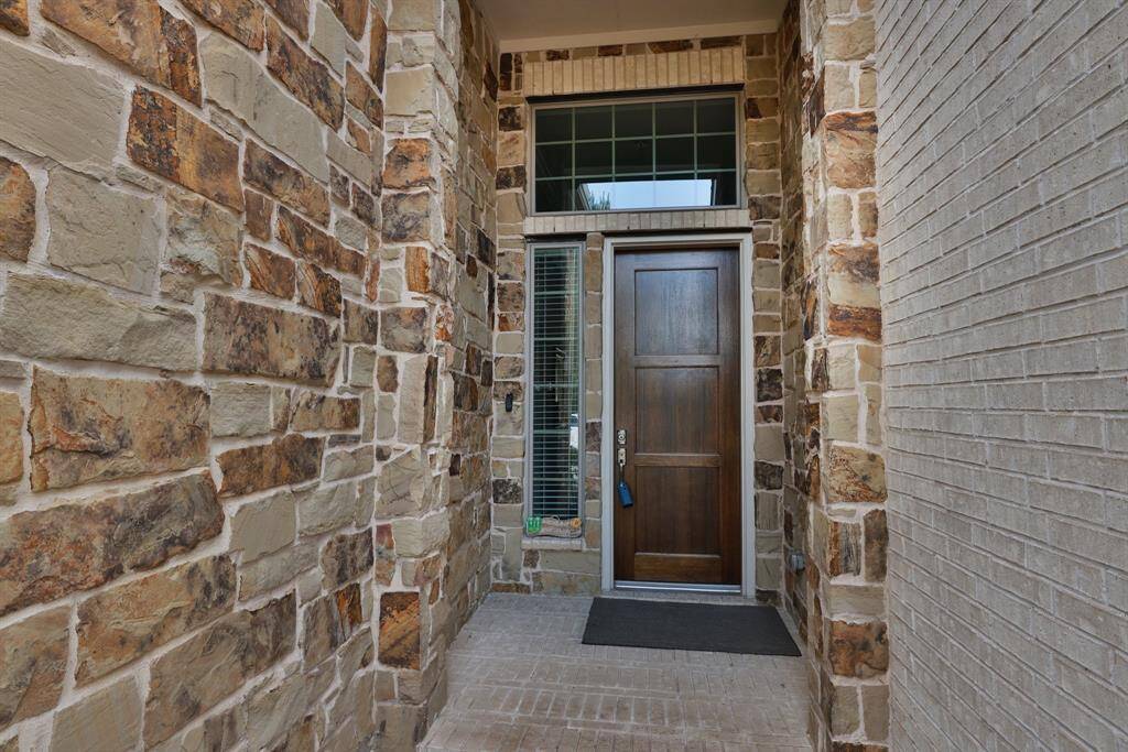 Built for comfort and convenience, this home offers easy-care three-sided brick exterior, soaring high ceilings, energy-efficient insulated Low-E windows, a high-efficiency HVAC system, and additional storage space in the garage.