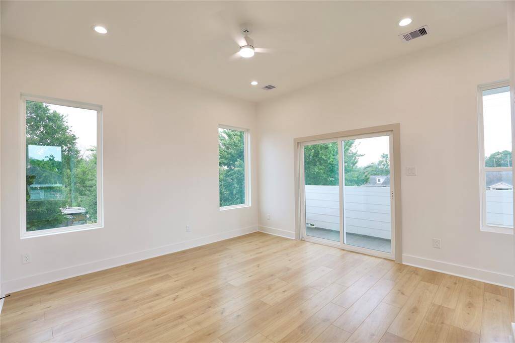 The windows and sliding door bring you to your private balcony overlooking your backyard.