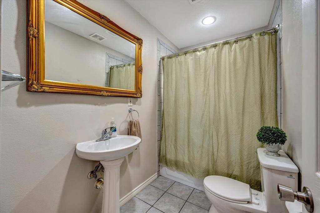 Enjoy the convenience of a guest bath with a versatile shower-tub combo.