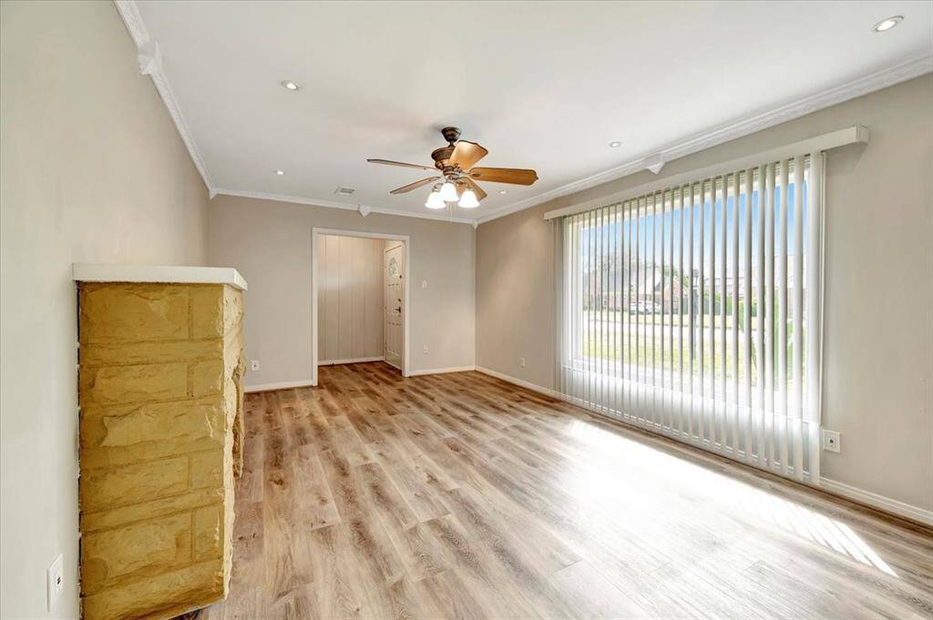 Step into your new home, featuring a bright and inviting living space with elegant flooring and abundant natural light.