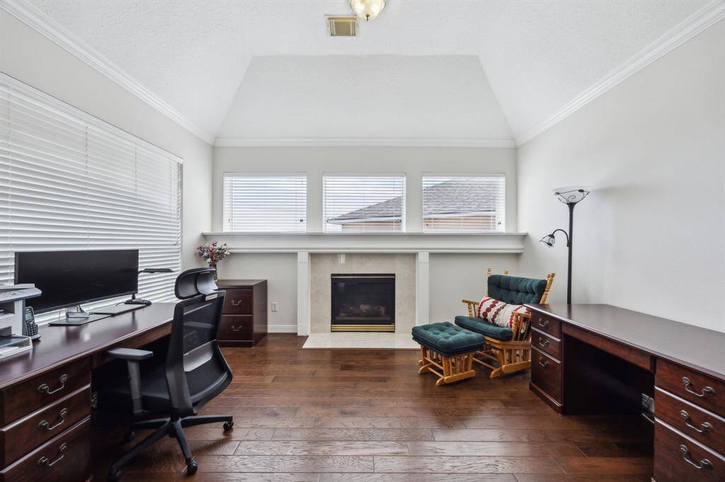 A cozy sitting area invites moments of quiet relaxation, whether enjoying a morning coffee or winding down with a good book. The fireplace adds a touch of luxury and warmth, creating the perfect ambiance for tranquil evenings. Generously sized and thoughtfully designed, this room offers both serenity and sophistication—an ideal place to unwind at the end of the day.