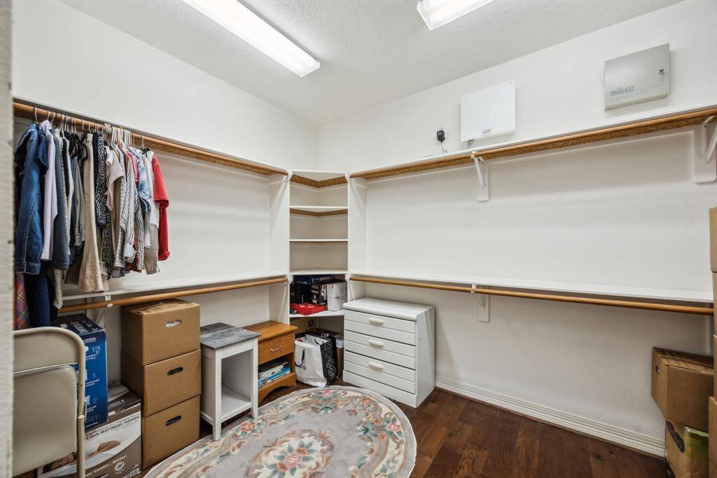 Whether you're getting ready for the day or winding down in the evening, this well-appointed closet provides the perfect blend of space, style, and convenience.