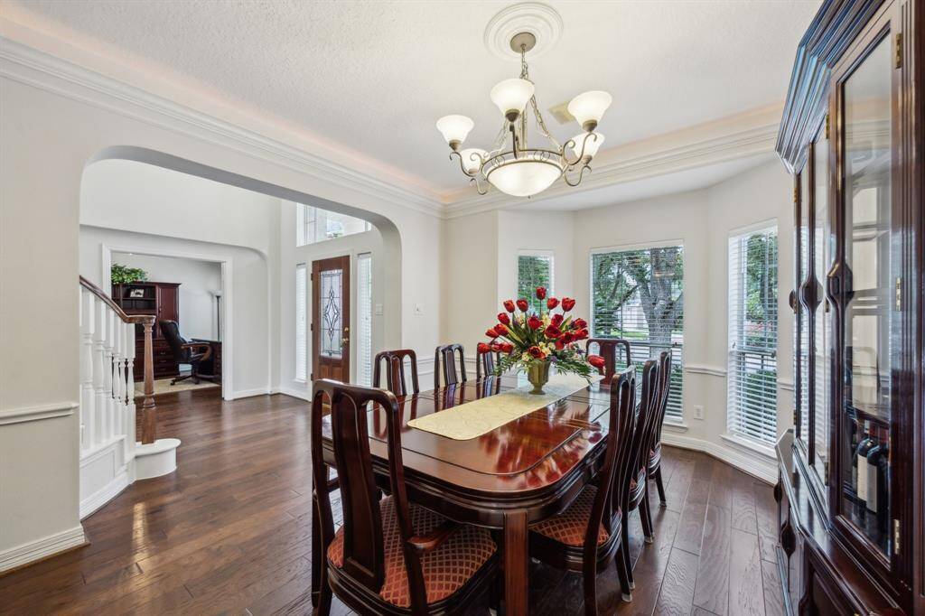 The room’s spacious layout allows for a large dining table, making it both functional and refined. Whether it's an intimate dinner or a festive gathering, this dining room sets the stage for gracious entertaining.