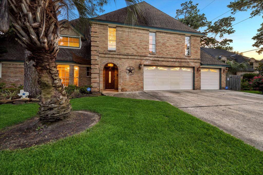 Side entrance, three car garage.