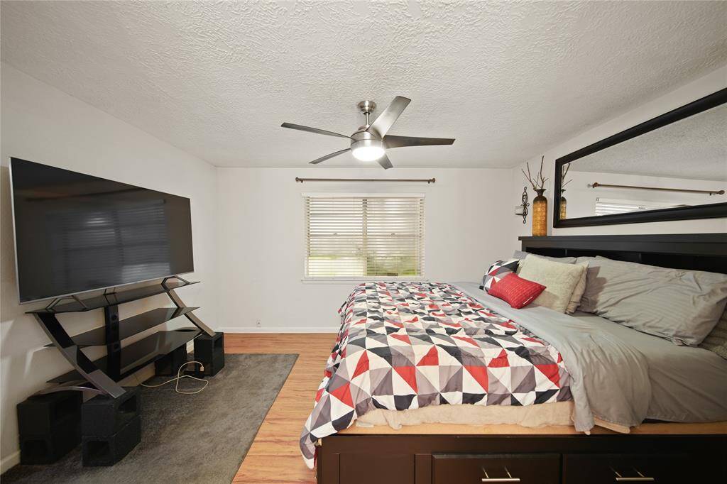 Ample space for a large television or a cozy reading nook. Whether you enjoy movie nights or delving into a classic novel, this room is designed for relaxation and comfort.