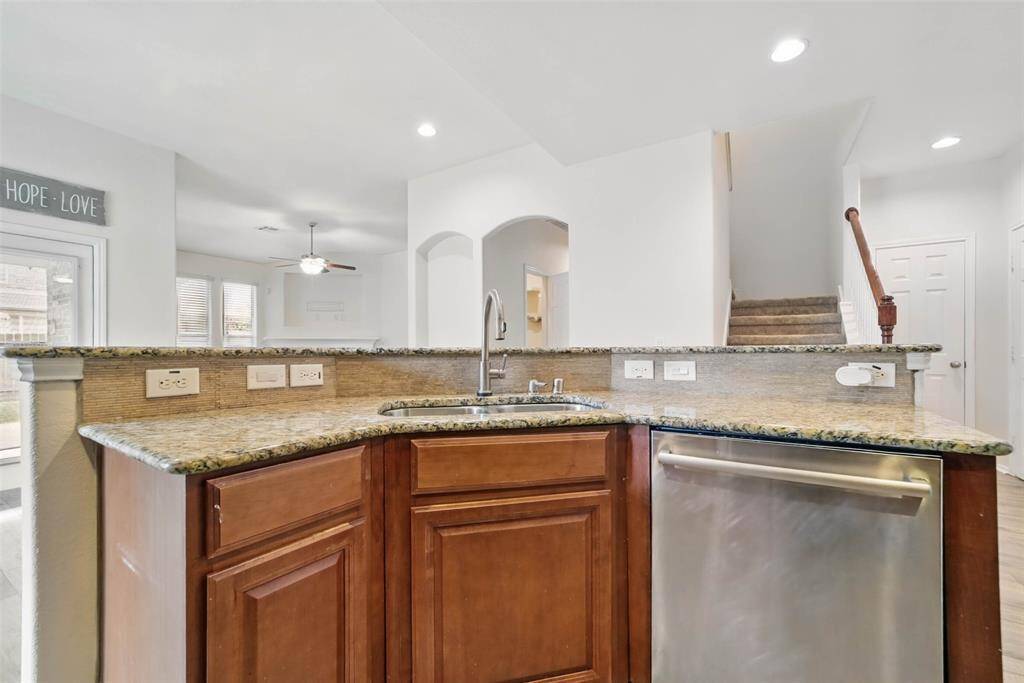 Granite counters and undermount sink.