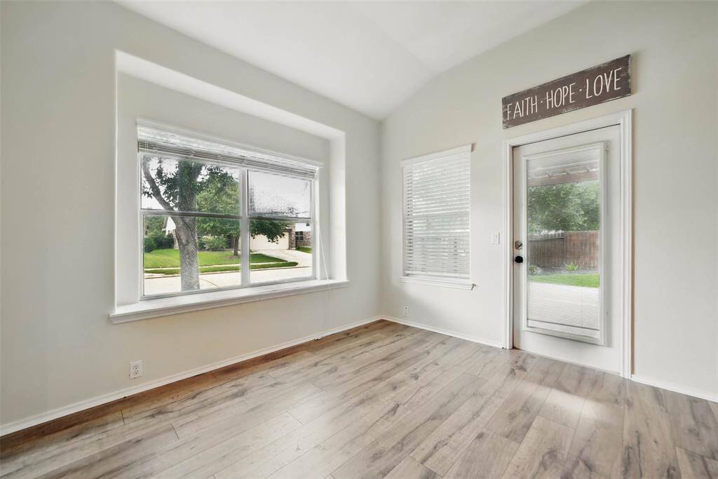 Breakfast room with recent laminate flooring.