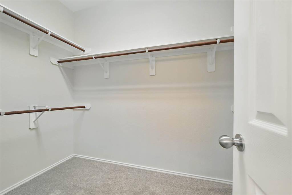 Large walk-in closet in the primary suite.