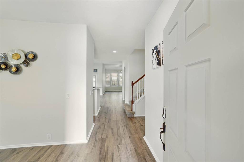 Entry leads to the formal dining room.