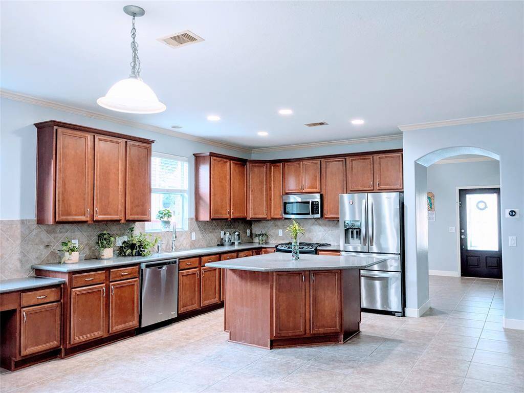 Kitchen view open to family room