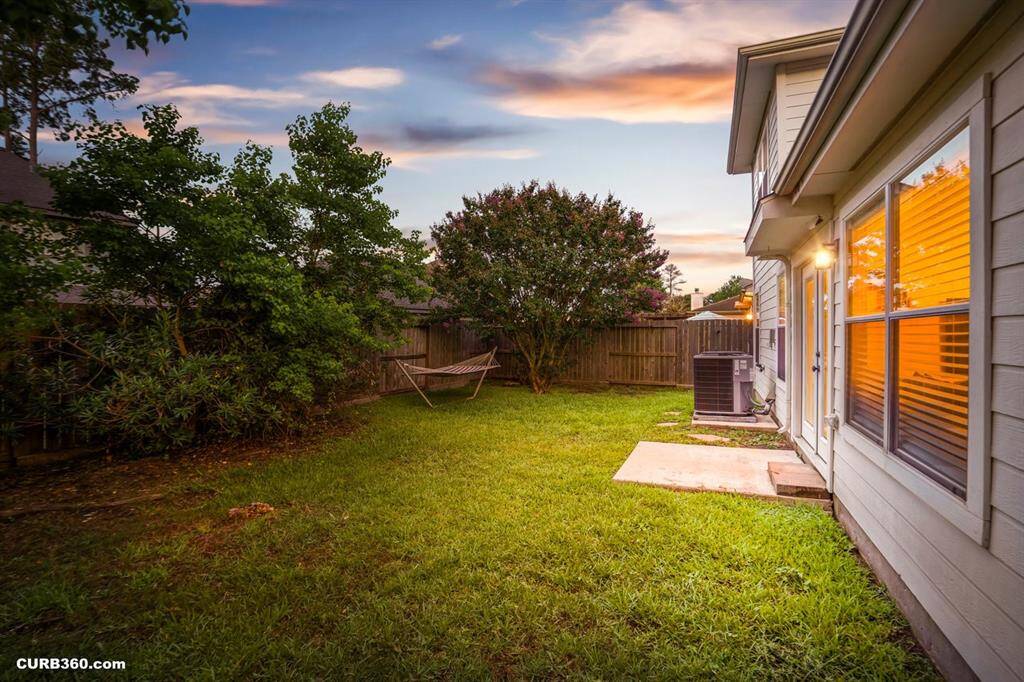Charming two-story home with a private fenced backyard, perfect for relaxation and outdoor gatherings. Enjoy the natural light streaming through large windows and the convenience of a spacious layout. Ideal for creating your dream garden oasis.