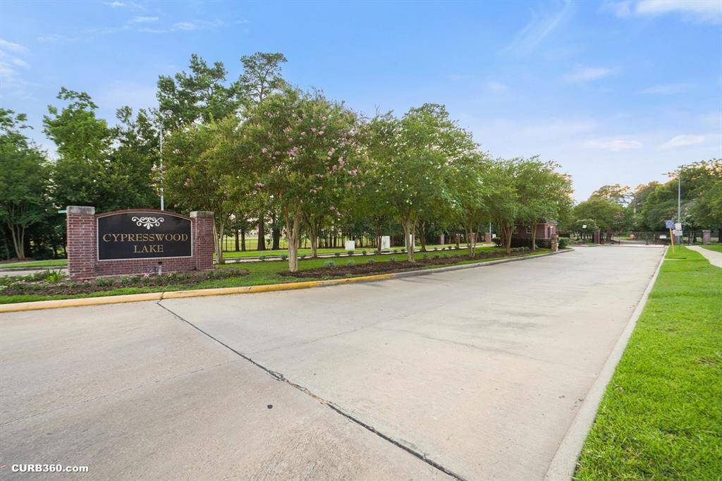 Enjoy a refreshing lifestyle with this inviting community pool, surrounded by lush greenery and perfect for relaxation and family fun.