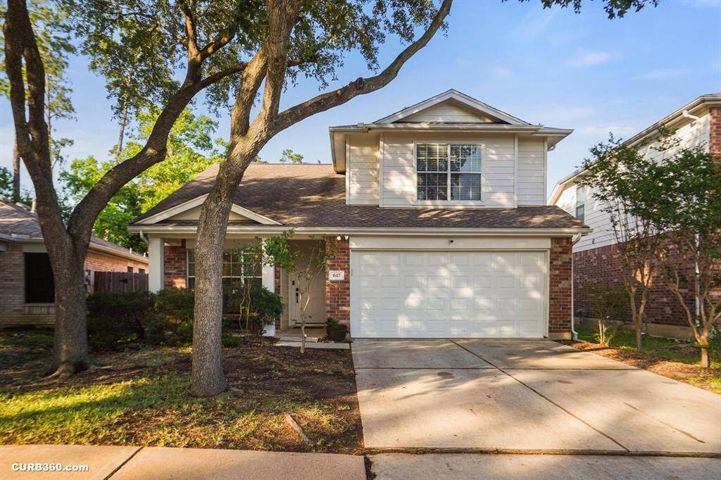 Charming two-story home with a welcoming facade and mature trees. Features a spacious two-car garage, cozy front porch, and a serene, shaded yard. Perfect for comfortable living in a peaceful neighborhood.
