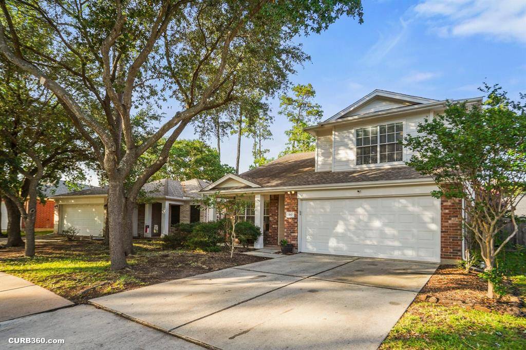 Charming two-story home with a welcoming brick facade, nestled in a serene neighborhood. Features a spacious driveway, lush greenery, and mature trees providing ample shade. Ideal for families seeking comfort and convenience.