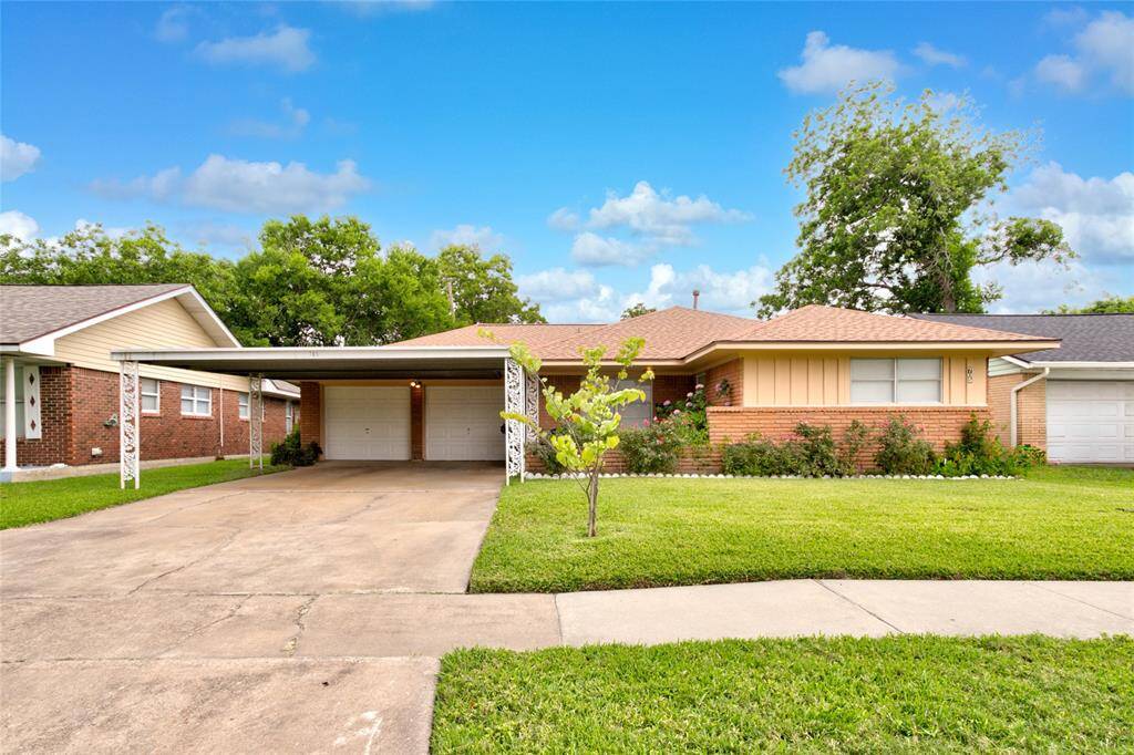Welcome to 705 Kalmer St. Which showcases a charming residential property with a well maintained exterior. The sidewalk is neatly paved, providing easy access and enhancing the curb appeal. Ample parking space is available, making it convenient for residents and visitors alike. Additionally, the property features a practical carport, offering shelter for vehicles while contributing to the overall functionality of the home.
