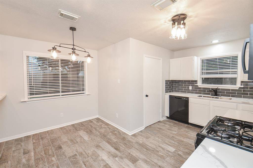 This kitchen comes equipped with a walk-in pantry
