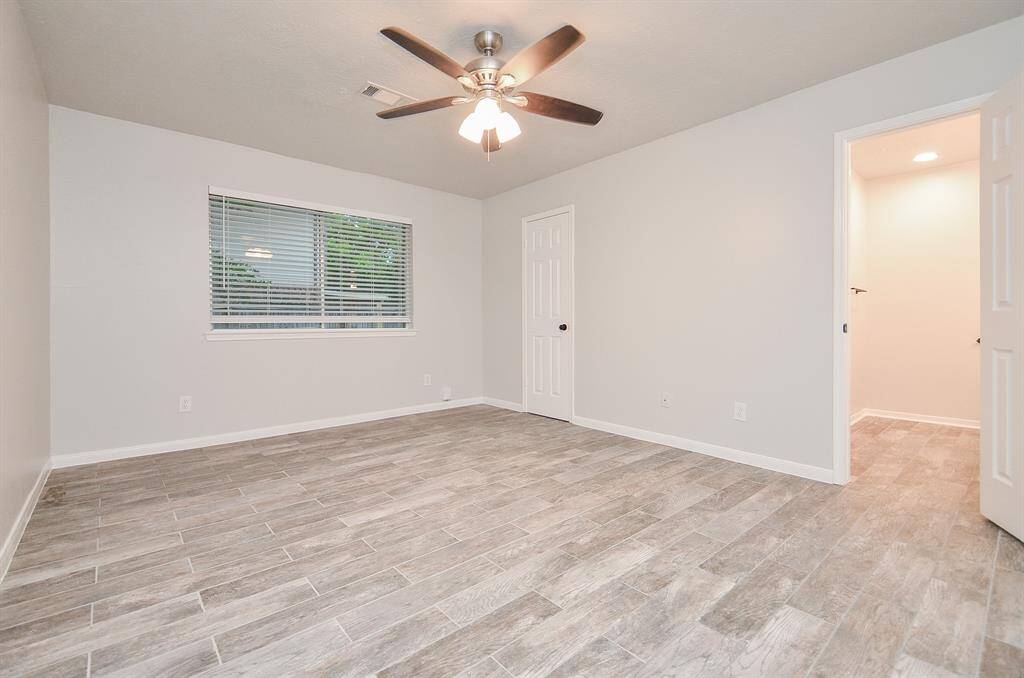 Primary bedroom with plenty of closet space