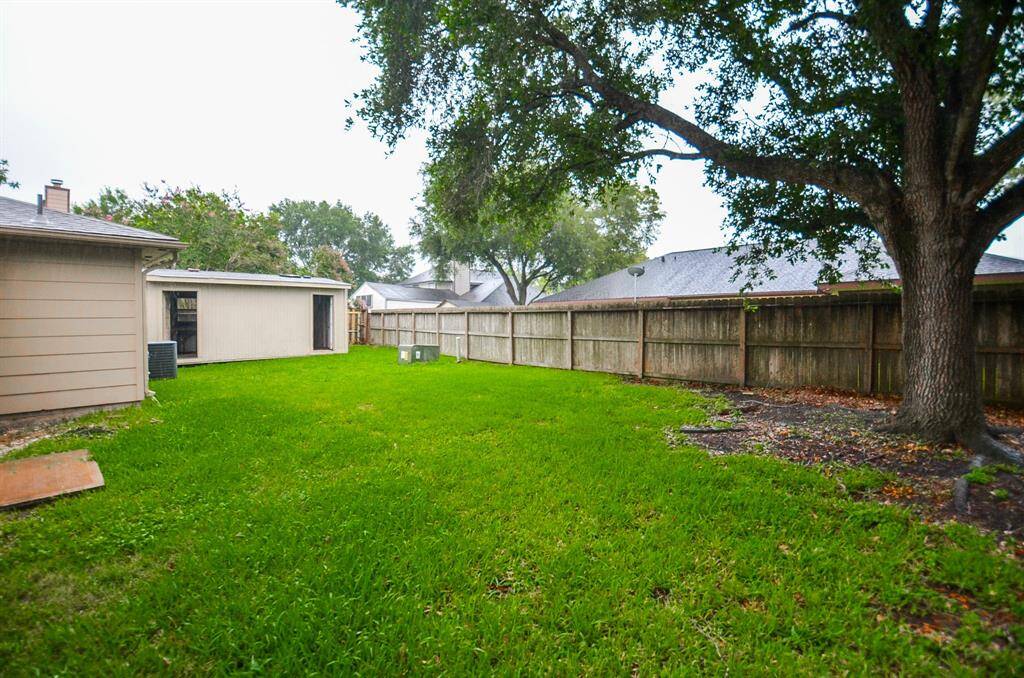 Nice backyard! Ample room for gardening, play equipment or the family grill.