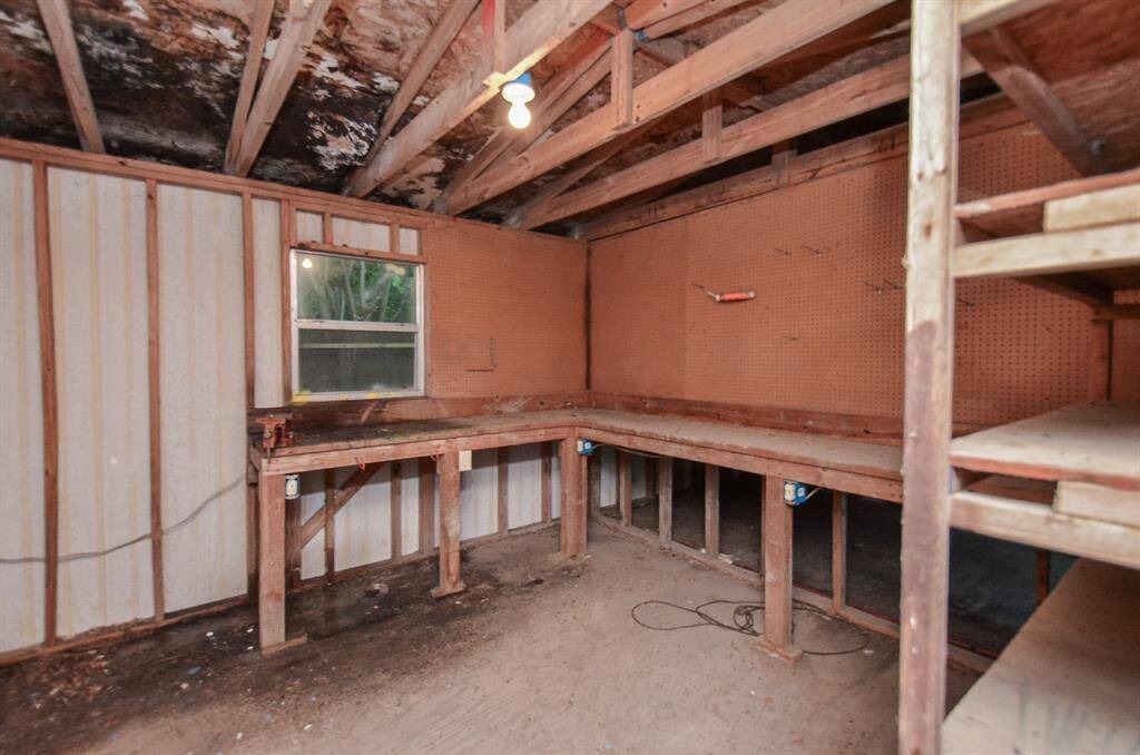 This well built storage shed could also be a small shop
