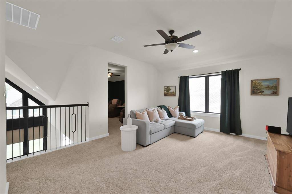 Upstairs flex space perfect for entertaining!