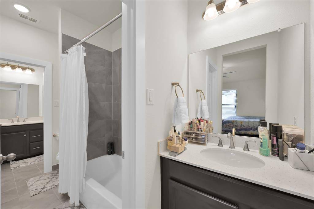 Jack and Jill bathroom with convenient access for upstairs bedrooms.