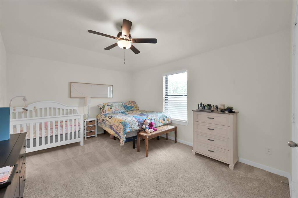 Oversized secondary bedroom perfect for guests or everyday living.