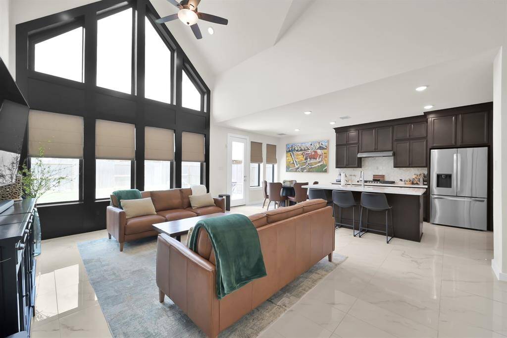 Cozy living room with natural light and space to relax and entertain!