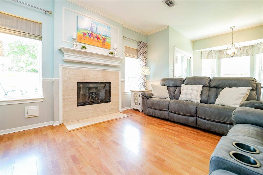 Family room features two large windows so you can enjoy the backyard views.