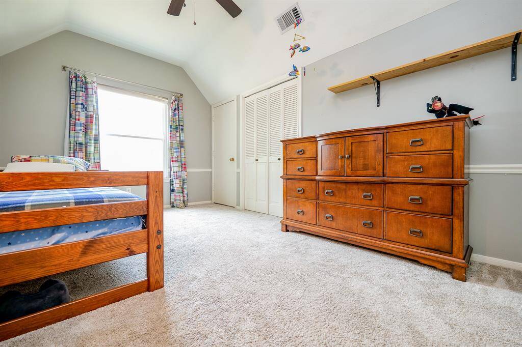 This flexible bedroom/space includes closet space for added versatility and storage.