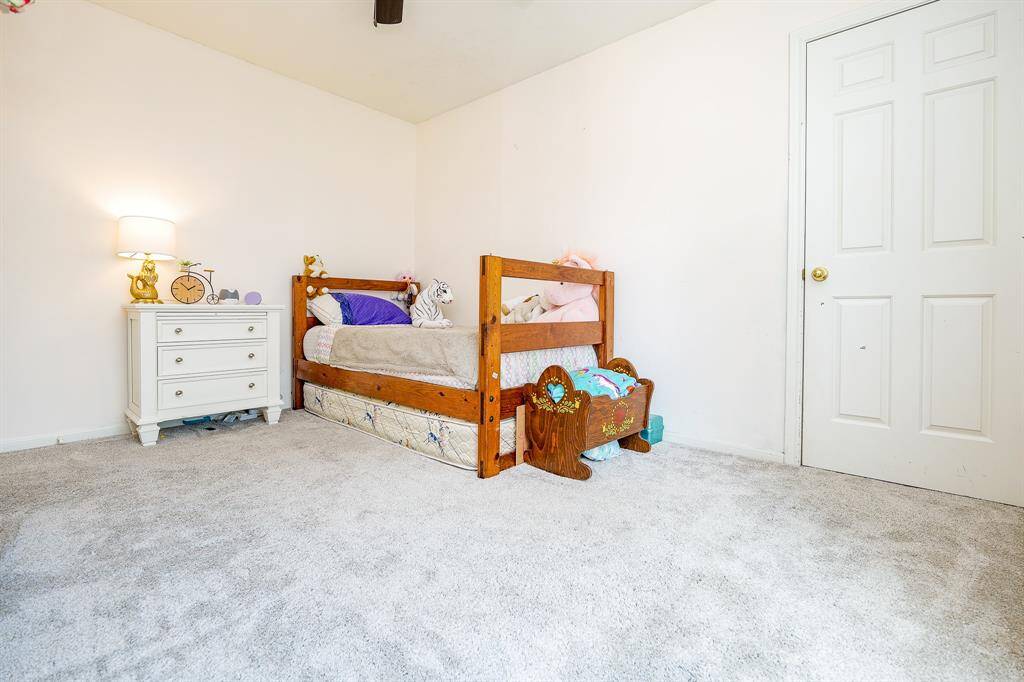 This bedroom features a walk-in closet.