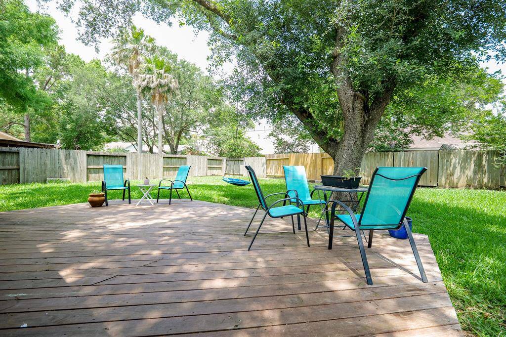 Imagine spending time with friends on this spacious back deck.