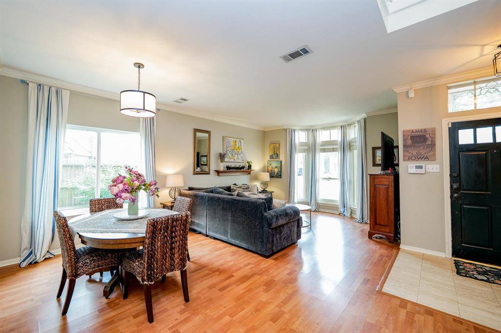 Open view of both dining and living spaces for easy flow.
