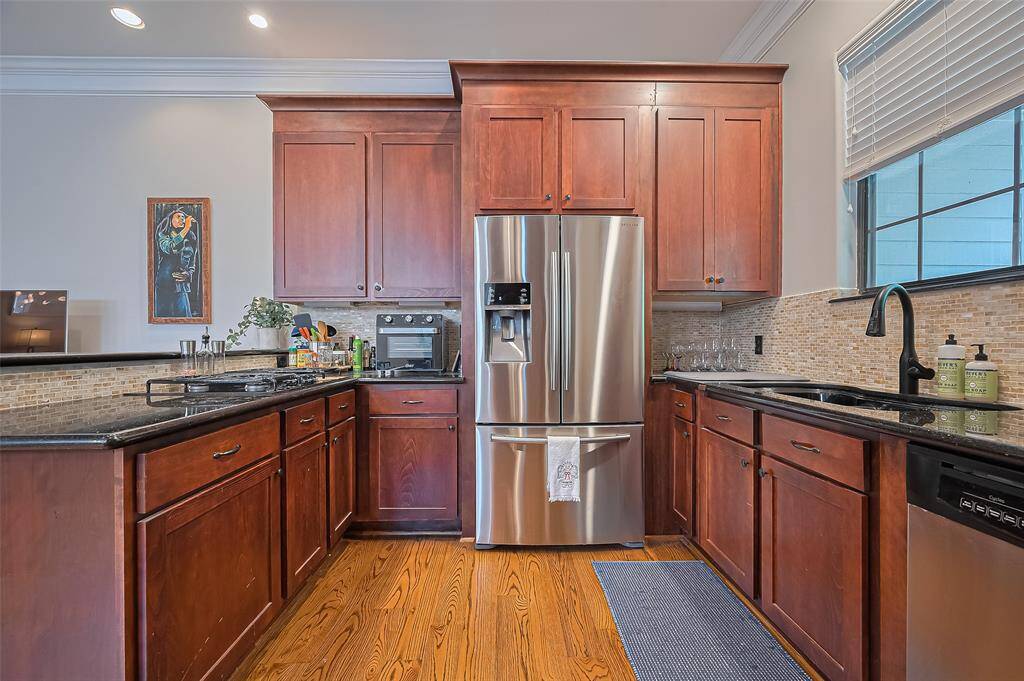 Window over the sink brings in wonderful light for creative cooking