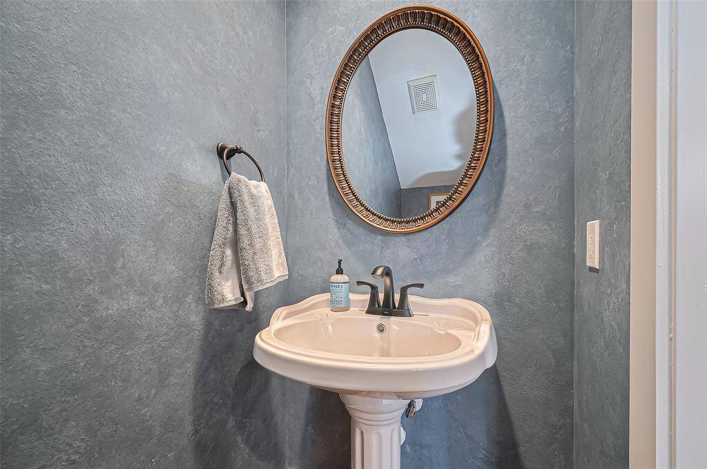 Half bath located just off the living area