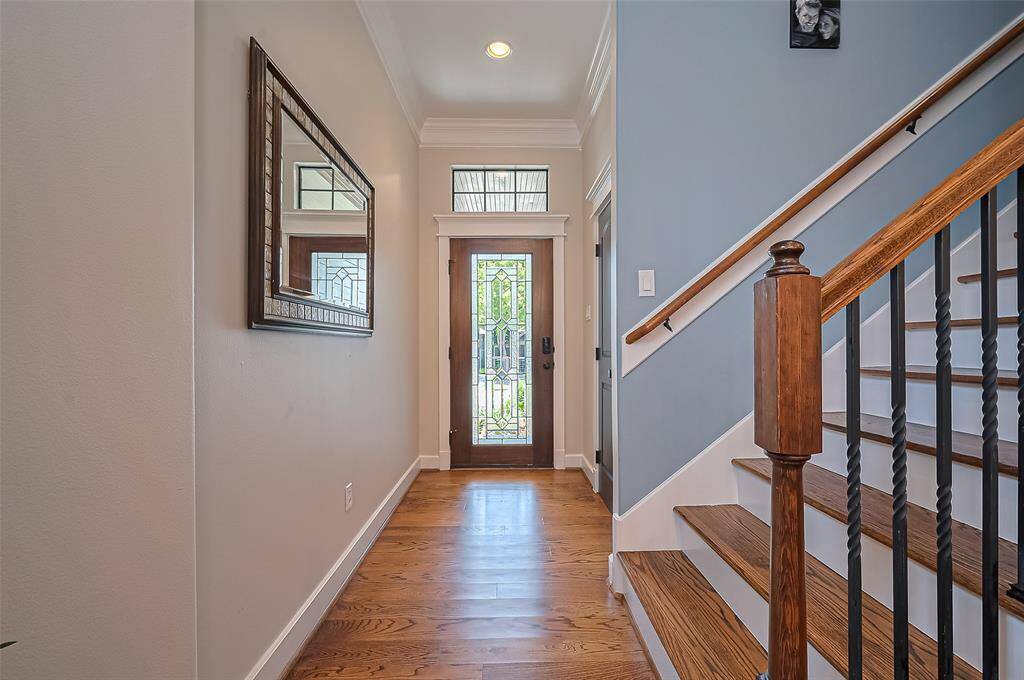 Entry featuring wood flooring