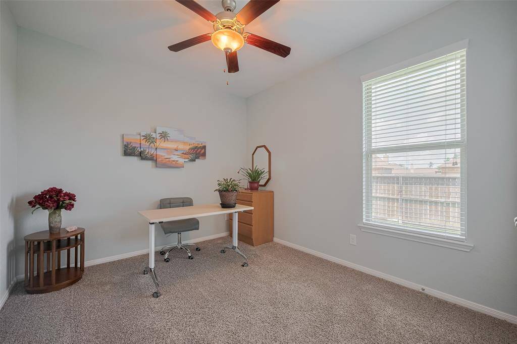 This flexible room features a large window with backyard views and can easily adapt to your needs as a guest room, playroom, or study.